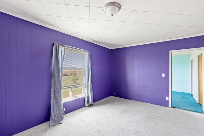 View of carpeted spare room | Image 25