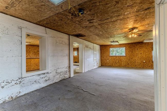 Empty room with carpet floors | Image 54