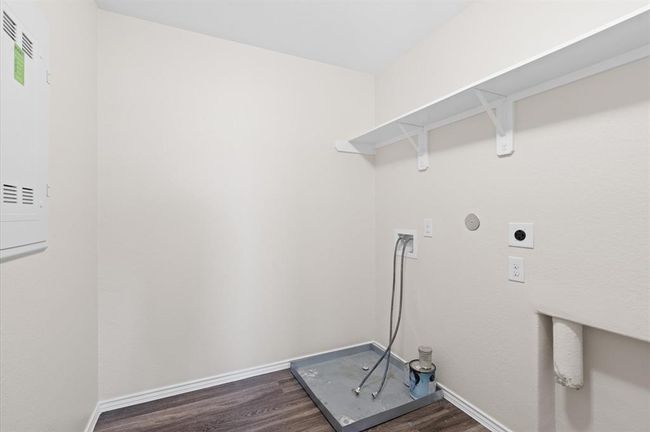 Upstairs large washer and dryer room. | Image 24
