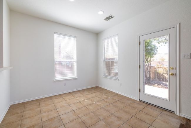 Dining Room w/New Paint Throughout Townhome | Image 13