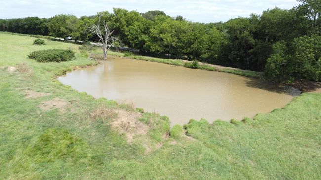 Surrounding community with a water view and a yard | Image 10