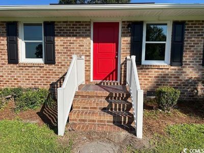 View of exterior entry featuring covered porch | Image 3