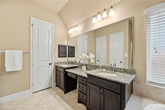 Primary bath vanity area. | Image 29
