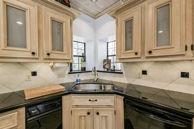 Corner sink with windows is perfect for growing herbs | Image 17