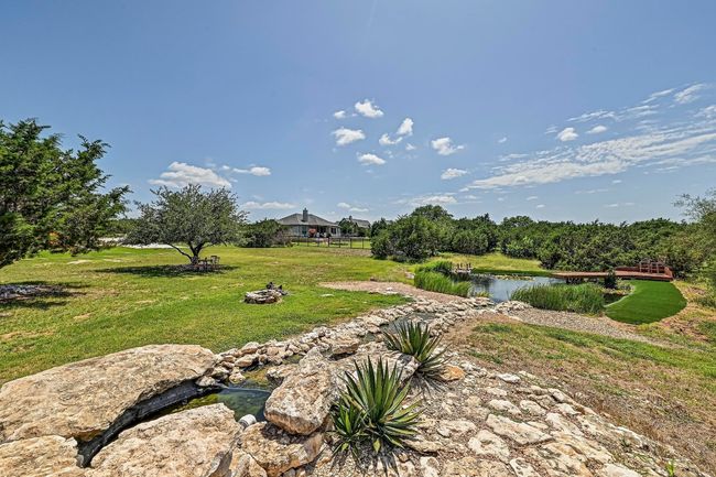 View of green lawn with a water view | Image 36