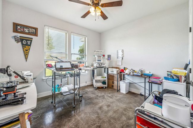 Home office featuring ceiling fan and baseboards | Image 17