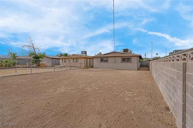 Back of house featuring a fenced backyard | Image 36