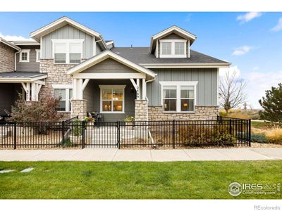 End-unit townhome filled with light and offering breathtaking lake and mountain views. | Image 1