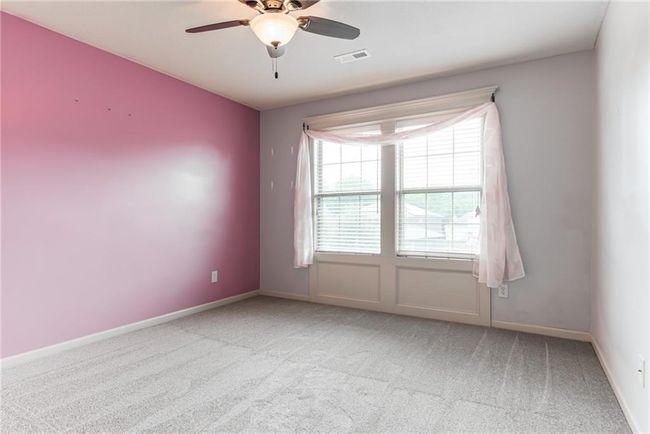 Empty room featuring carpet floors and a ceiling fan | Image 38