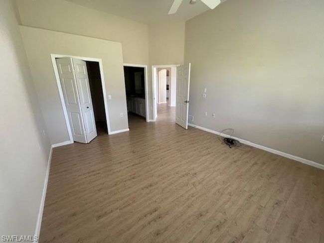 View from Primary bedroom now without furniture toward living room area | Image 20