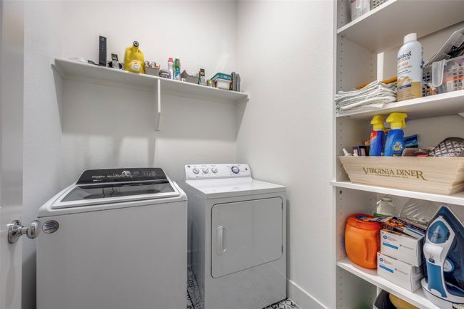 Clothes washing area with laundry area and separate washer and dryer | Image 32