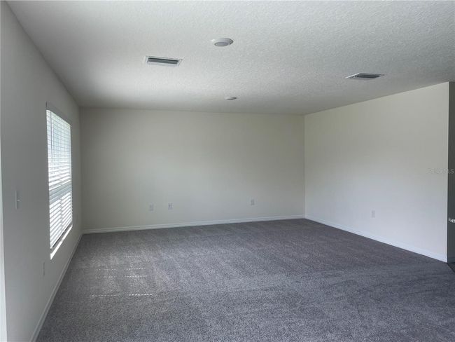 7946 Broad Pointe Dr, House other with 3 bedrooms, 2 bathrooms and null parking in ZEPHYRHILLS FL | Image 5