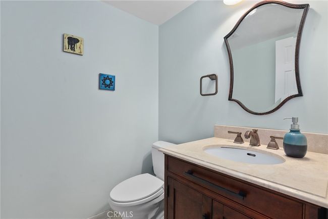 Powder room downstairs for guests. | Image 20