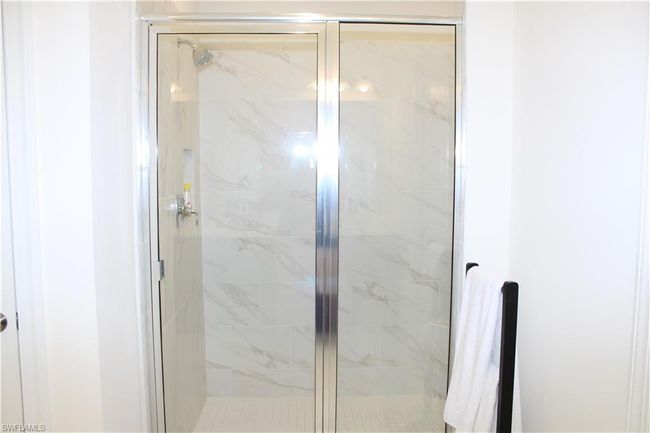 Master Full bathroom featuring a shower stall | Image 20