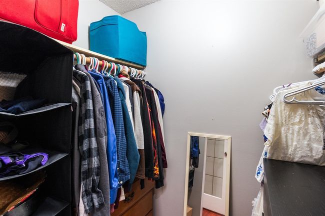 View of spacious closet | Image 17