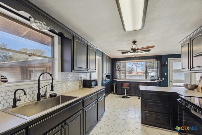 Gather, cook, connect — with TWO bar areas and space for everyone to join the fun | Image 7