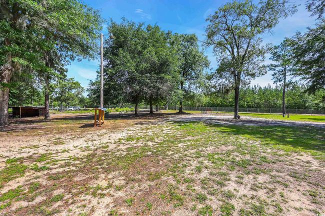 Rear portion of cleared property. Metal fencing not staying with the property. | Image 12