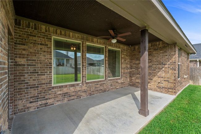 View of patio / terrace with ceiling fan | Image 31