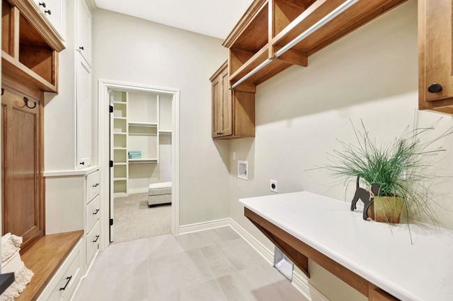 Interior space with washer hookup and electric dryer hookup | Image 27