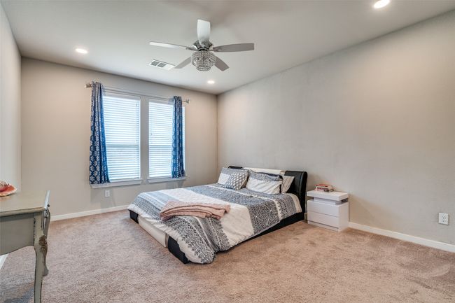 Bedroom with carpet floors, recessed lighting, and ceiling fan | Image 14