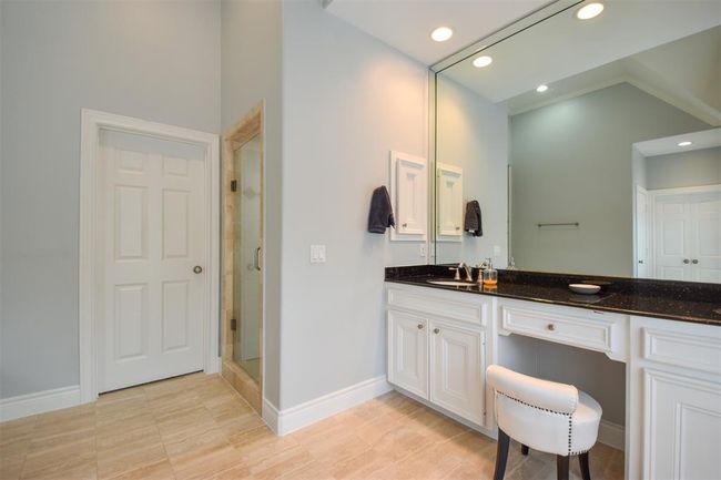 Alternate view of the bathroom - the door leads to the second primary closet | Image 20