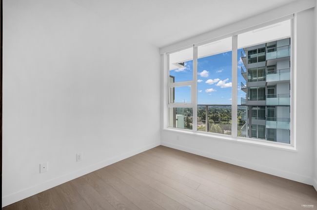 Unfurnished room with baseboards and wood finished floors | Image 16