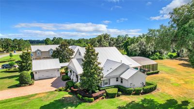 434 Long And Winding Road, House other with 3 bedrooms, 3 bathrooms and null parking in Howey In The Hills FL | Image 3