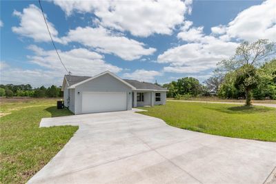 1 Malauka Loop Lane, House other with 3 bedrooms, 2 bathrooms and null parking in Ocklawaha FL | Image 1