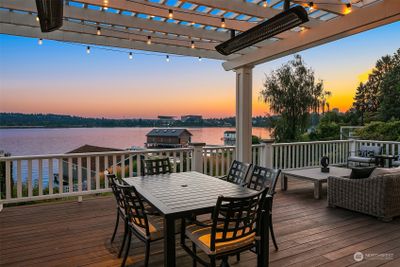 Al fresco dining area has heat lamps for year round enjoyment. | Image 1