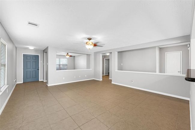 Living room, facing towards the front of the home. | Image 5