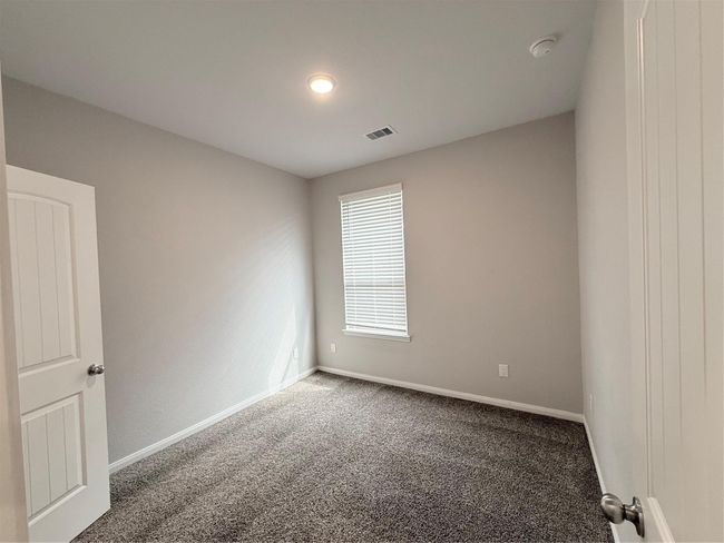 14501 SUGAR PINES DR - Secondary Bedroom - three bedrooms and full bath at the front of the home | Image 39