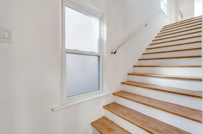 Stairs with healthy amount of natural light | Image 19