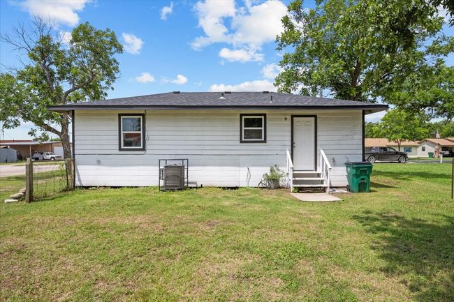 Rear view of house with entry steps | Image 16