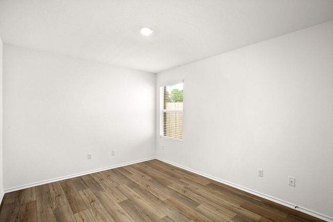 Empty room featuring wood finished floors and baseboards | Image 22