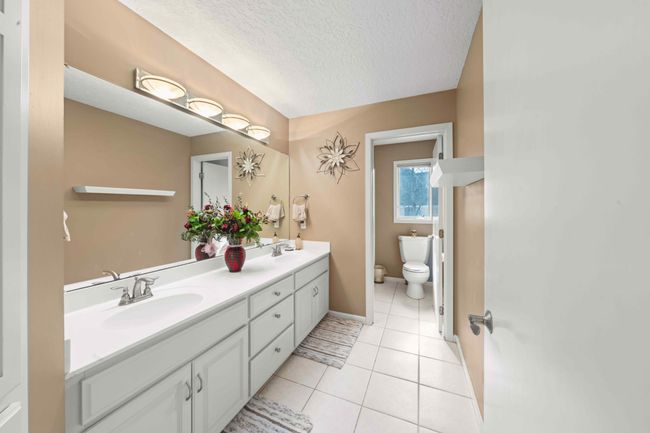 Upper level full bath with dual sinks | Image 44