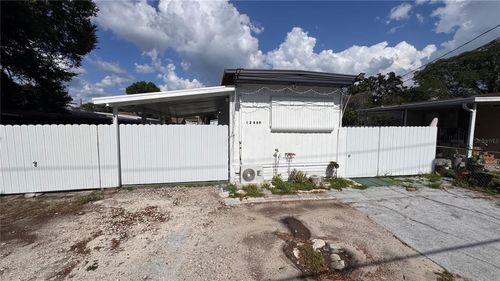 12909 Four Oaks Rd, Tampa, FL, 33624-4219 | Card Image
