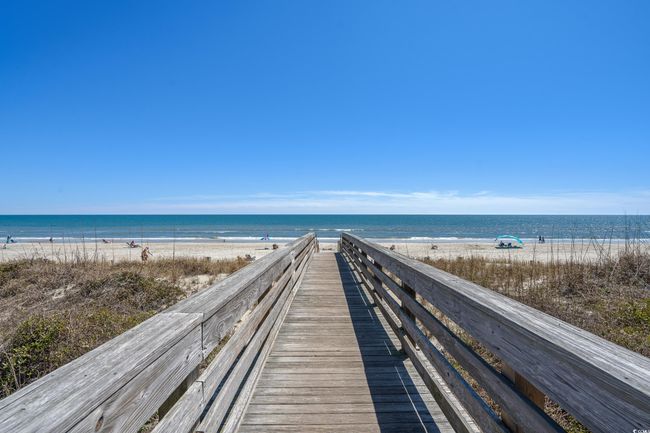 Surrounding community featuring a water view and a view of the beach | Image 38