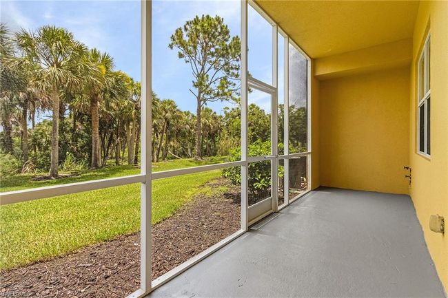View of unfurnished sunroom | Image 13