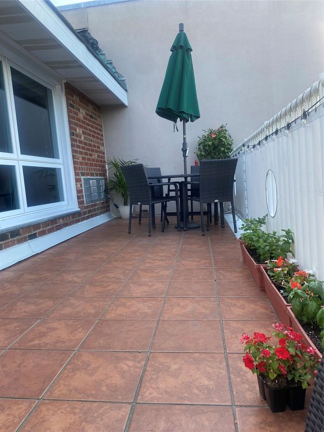 View of patio featuring outdoor dining area | Image 15