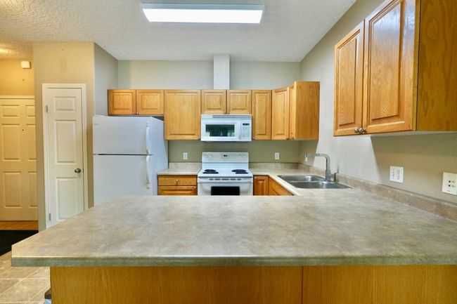 404 - 9810 94 St, Condo with 2 bedrooms, 2 bathrooms and 1 parking in Peace River AB | Image 25