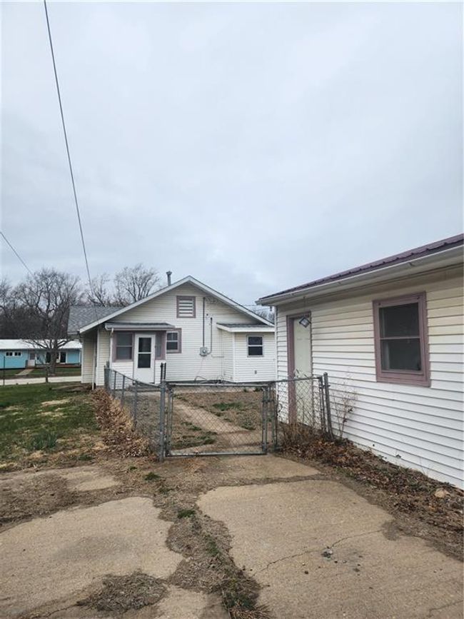 View of front of property with a gate and fence | Image 9