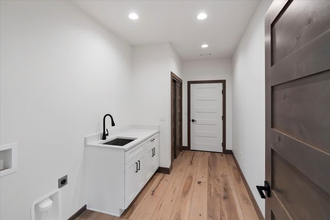 Laundry room to garage | Image 30