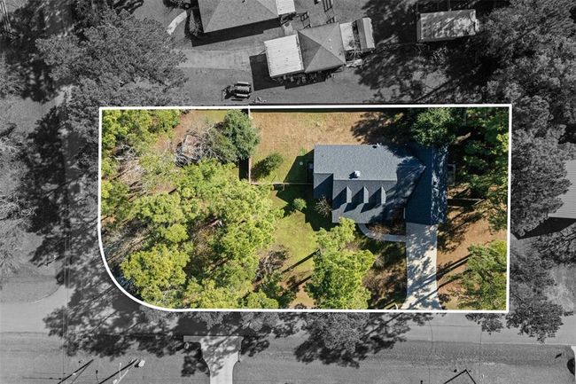 Aerial view of the home to demonstrate the property lines. The home extends all the way to the street! | Image 5