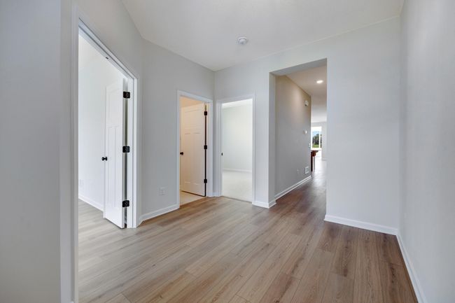 Foyer entry, 1st bedroom and den on left | Image 21