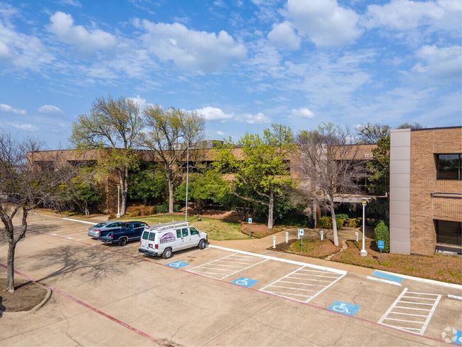 View of uncovered parking lot | Image 5