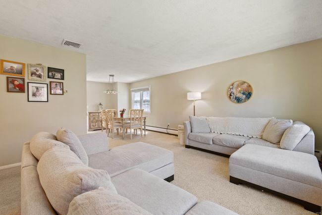 living room open to dining room | Image 13