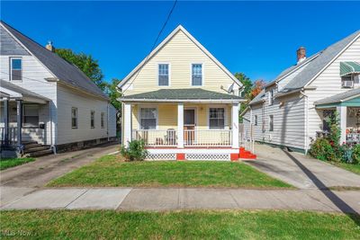 View of front of house with a front lawn and covered porch | Image 1