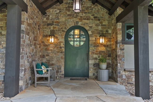 Awe inspiring entry way with gorgeous custom curved door. | Image 16