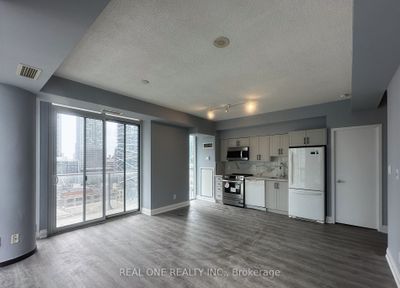 1408 - 126 Simcoe St, Condo with 3 bedrooms, 2 bathrooms and 1 parking in Toronto ON | Image 1