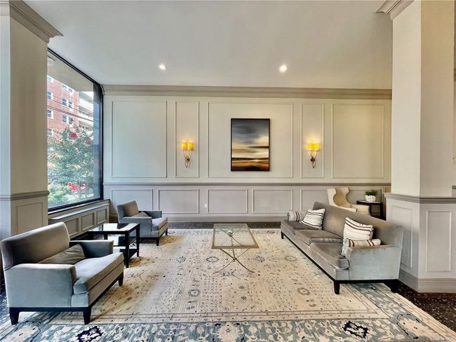 Community lobby with a decorative wall and recessed lighting | Image 24